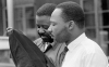 The Rev. Martin Luther King Jr., right, and his close associate, Rev. Ralph Abernathy, are released after 8 days from a jail in Birmingham, Ala., on April 20, 1963. 